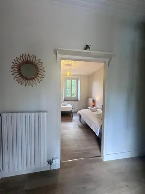 Un ou plusieurs lits dans un hébergement de l'établissement Maison de la Fontaine - Typique - Bourg de Collonges