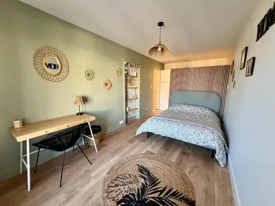 Un ou plusieurs lits dans un hébergement de l'établissement Appartement de standing rénové