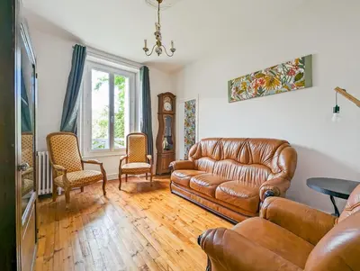 Coin salon dans l'établissement Maison des années 30 - Vic-Sur-Cère - 4 personnes