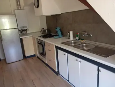Cuisine ou kitchenette dans l'établissement Appartement renové 46m2 - Climatisé, Calme et proche commodités