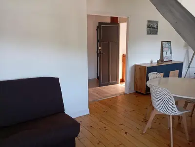 Coin salon dans l'établissement Appartement renové 46m2 - Climatisé, Calme et proche commodités