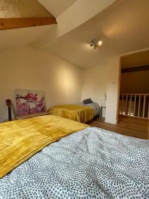Un ou plusieurs lits dans un hébergement de l'établissement Lascaux Countryside Gîtes 4 people