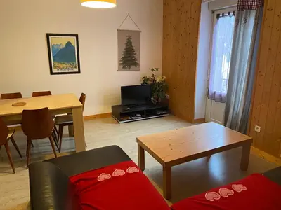 Coin salon dans l'établissement Val-locations la paix 7