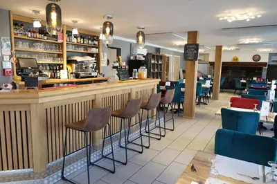 Salon ou bar de l'établissement Le relais de poste