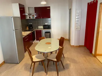 Cuisine ou kitchenette dans l'établissement Val-location la paix 6