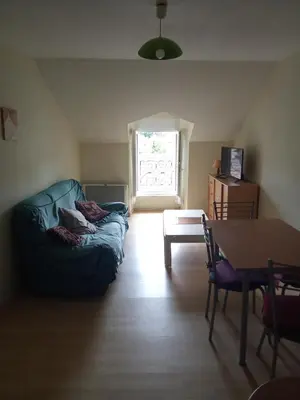 Coin salon dans l'établissement Appartement