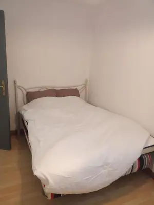 Un ou plusieurs lits dans un hébergement de l'établissement Appartement