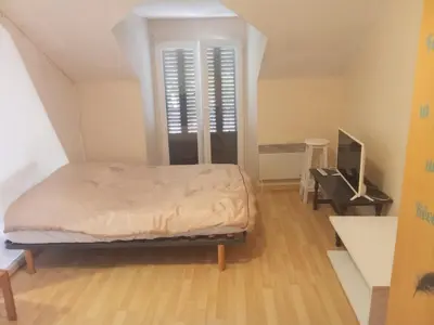 Un ou plusieurs lits dans un hébergement de l'établissement Appartement