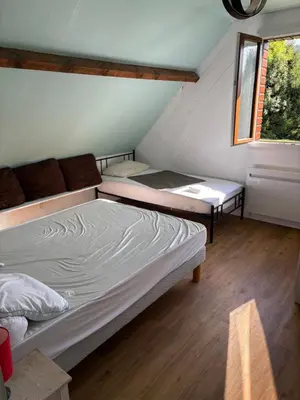 Un ou plusieurs lits dans un hébergement de l'établissement Chalet Louise 16 personnes - 5 chambres