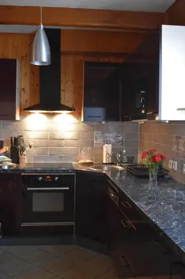 Cuisine ou kitchenette dans l'établissement Gîte des Sommets spa privatif vue panoramique sur les montagnes