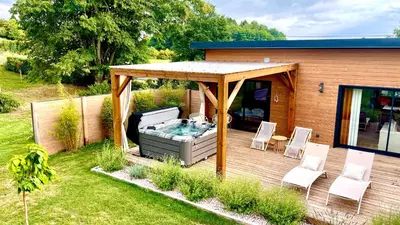Jardin de l'établissement Chalet Zénaé - Chalet Cosy avec spa & Sauna