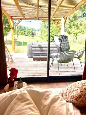 Coin salon dans l'établissement Chalet Zénaé - Chalet Cosy avec spa & Sauna