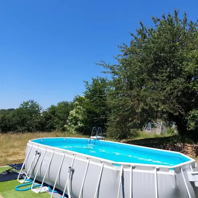 Piscine de l'établissement Le Potagîte, Gîte dans un jardin potager Limousin ou située à proximité