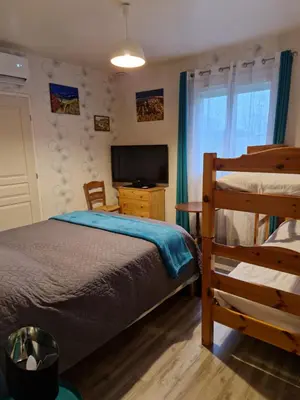 Un ou plusieurs lits dans un hébergement de l'établissement Chambre d hotes dans maison au calme et bien située pour visiter de nombreux sites