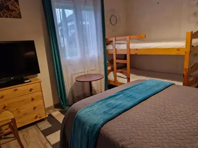 Un ou plusieurs lits dans un hébergement de l'établissement Chambre d hotes dans maison au calme et bien située pour visiter de nombreux sites