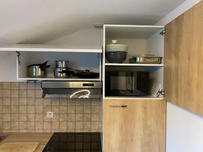 Cuisine ou kitchenette dans l'établissement Appartement centre ville