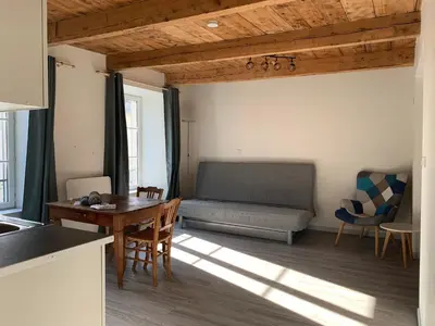 Coin salon dans l'établissement Chez Burons&Bouchons, Le Refuge Gourmand et Authentique