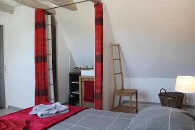 Un ou plusieurs lits dans un hébergement de l'établissement Les Mazaux avec piscine chauffée au nord de Sarlat