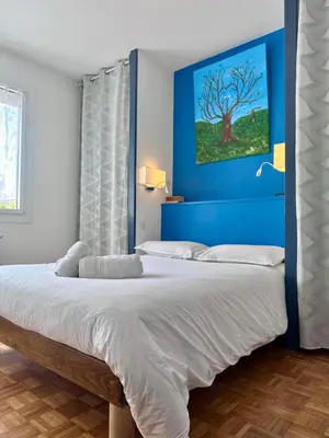 Un ou plusieurs lits dans un hébergement de l'établissement Casa Nobel - Joli logement pour 4 pers - Balcon