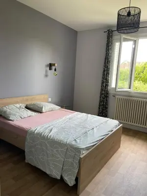 Un ou plusieurs lits dans un hébergement de l'établissement Villa 400m2