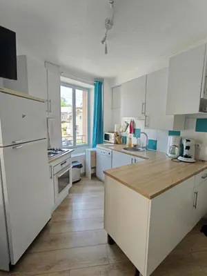 Cuisine ou kitchenette dans l'établissement Le Nid du Haut