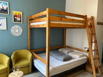 Un ou plusieurs lits dans un hébergement de l'établissement Studio dans l'ancien Palace du Mont-Dore