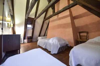 Un ou plusieurs lits dans un hébergement de l'établissement Manoir de Foussac