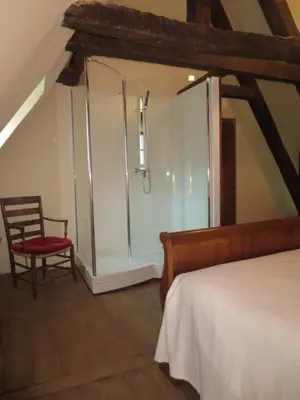 Un ou plusieurs lits dans un hébergement de l'établissement Manoir de Foussac