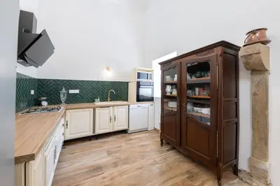 Cuisine ou kitchenette dans l'établissement Charme nature et grand espace