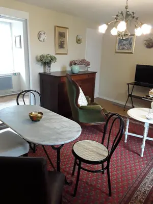 Télévision ou salle de divertissement dans l'établissement Appartement dans Maison de Bourg