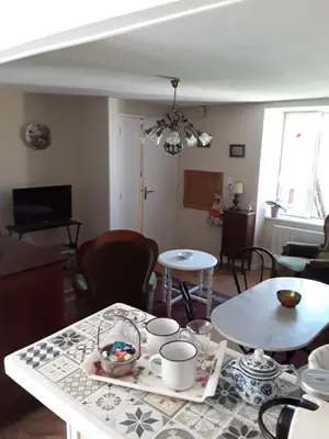 Coin salon dans l'établissement Appartement dans Maison de Bourg