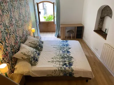Un ou plusieurs lits dans un hébergement de l'établissement La maison du Chateau
