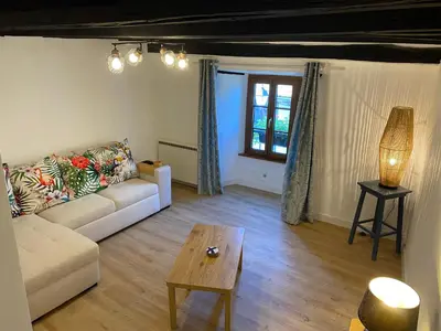 Coin salon dans l'établissement La maison du Chateau