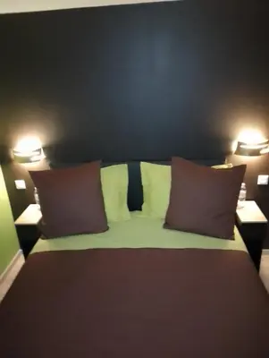 Un ou plusieurs lits dans un hébergement de l'établissement Appartement proche de la Mairie