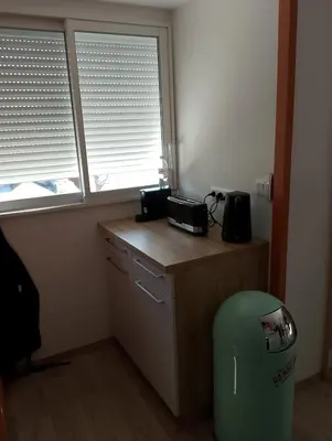 Cuisine ou kitchenette dans l'établissement Appartement proche de la Mairie