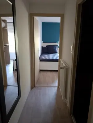 Un ou plusieurs lits dans un hébergement de l'établissement Appartement proche de la Mairie