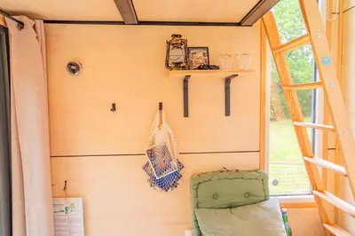 Coin salon dans l'établissement Bois aux Cheirilles - 15min Murol - Puy de Dome