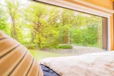 Un ou plusieurs lits dans un hébergement de l'établissement Bois aux Cheirilles - 15min Murol - Puy de Dome