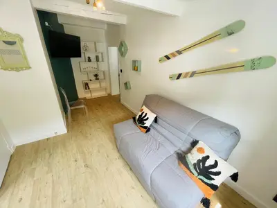 Coin salon dans l'établissement Petit appartement tout confort
