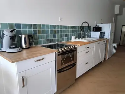 Cuisine ou kitchenette dans l'établissement Appartement en RC au bord du lac