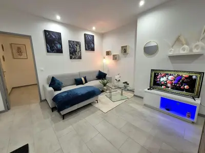 Télévision ou salle de divertissement dans l'établissement Appartement complet a 2 pas de la Gare-Centre