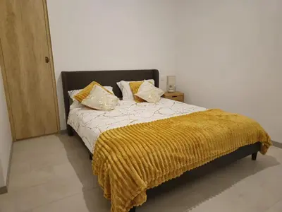 Un ou plusieurs lits dans un hébergement de l'établissement Appartement complet a 2 pas de la Gare-Centre