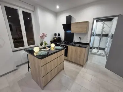 Cuisine ou kitchenette dans l'établissement Appartement complet a 2 pas de la Gare-Centre
