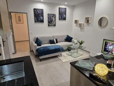 Coin salon dans l'établissement Appartement complet a 2 pas de la Gare-Centre