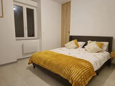 Un ou plusieurs lits dans un hébergement de l'établissement Appartement complet a 2 pas de la Gare-Centre