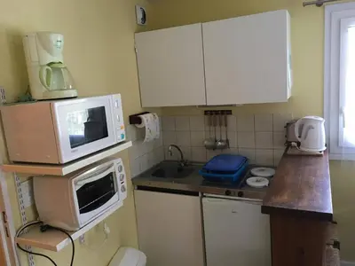 Cuisine ou kitchenette dans l'établissement T2 Lioran pieds des pistes