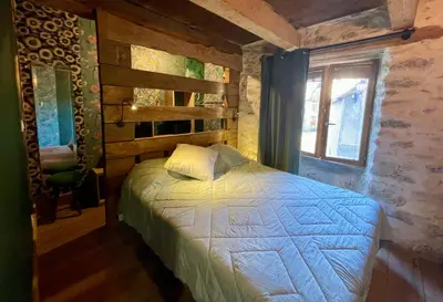 Un ou plusieurs lits dans un hébergement de l'établissement Warm and cozy house