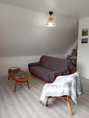 Coin salon dans l'établissement Les MILANS