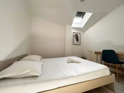 Un ou plusieurs lits dans un hébergement de l'établissement Le Grand Nid en Haut, duplex