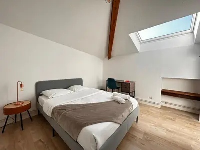 Un ou plusieurs lits dans un hébergement de l'établissement Le Grand Nid en Haut, duplex